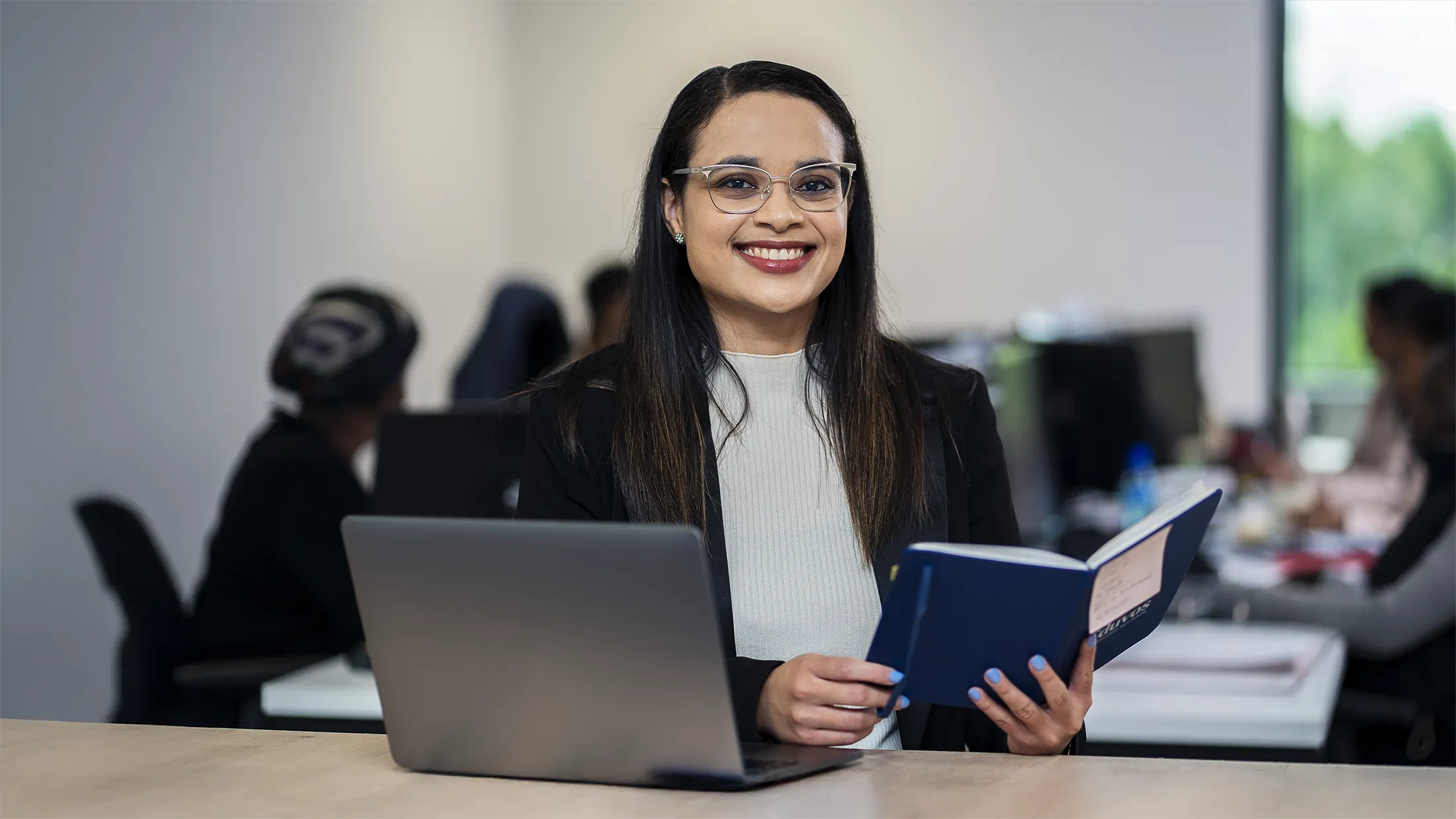 One-on-one mentorship session between experienced alumni and recent graduate